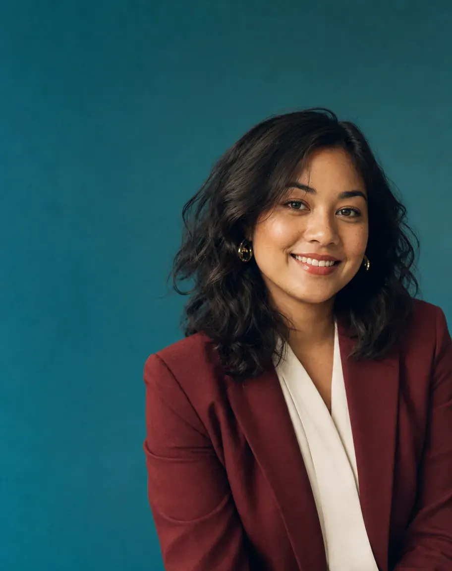 Editorial studio portrait of Aisha Rahman, Content Strategist at hubStudio.