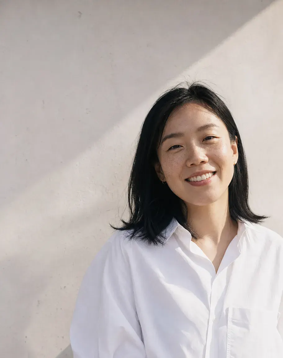 Editorial studio portrait of Wei Lin Tan, Brand Designer at hubStudio.